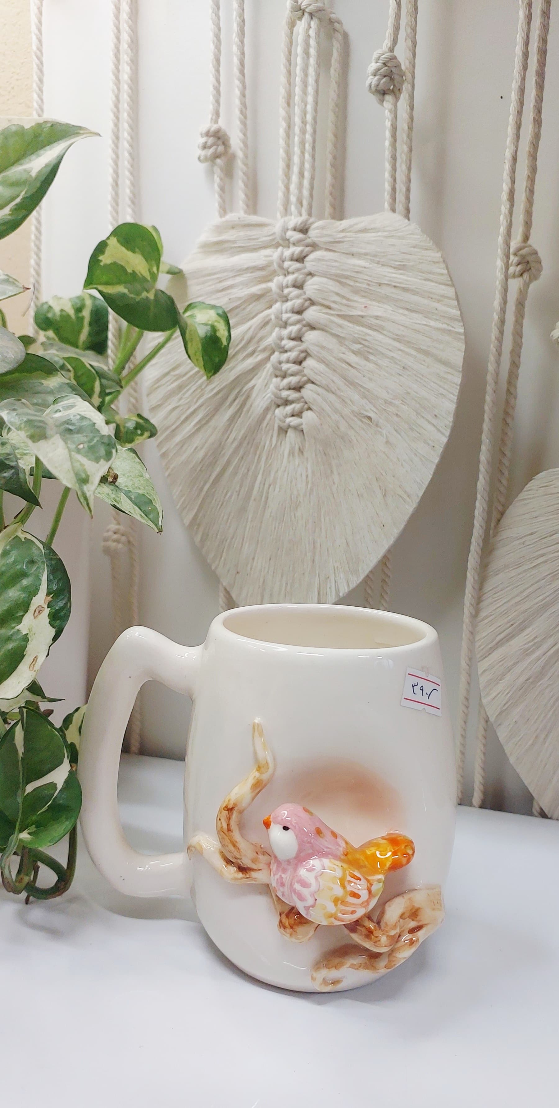 خرید آنلاین ماگ خمره ای دست ساز نقش برجسته طرح پرنده صورتی  با بهترین قیمت | ارسال فوری