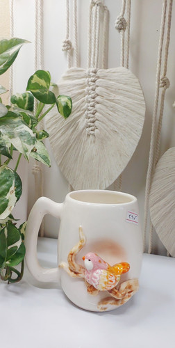 خرید آنلاین ماگ خمره ای دست ساز نقش برجسته طرح پرنده صورتی با بهترین قیمت | ارسال فوری